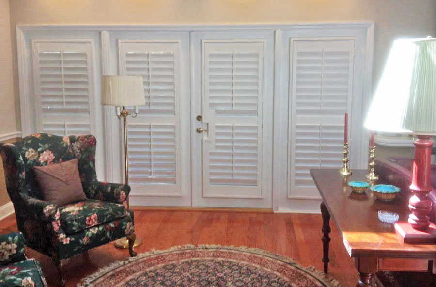 White plantation shutters on French doors